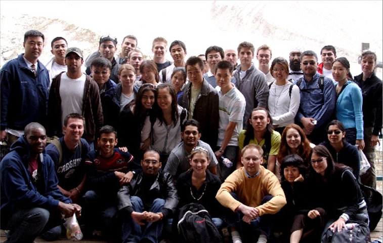 A Swiss Finance Academy cohort gathered for a group photograph in the mountains